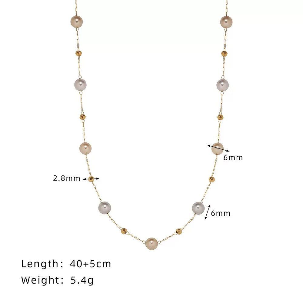 Collana e Bracciale in Acciaio Titanio con Perle Imitazione – Design Delicato